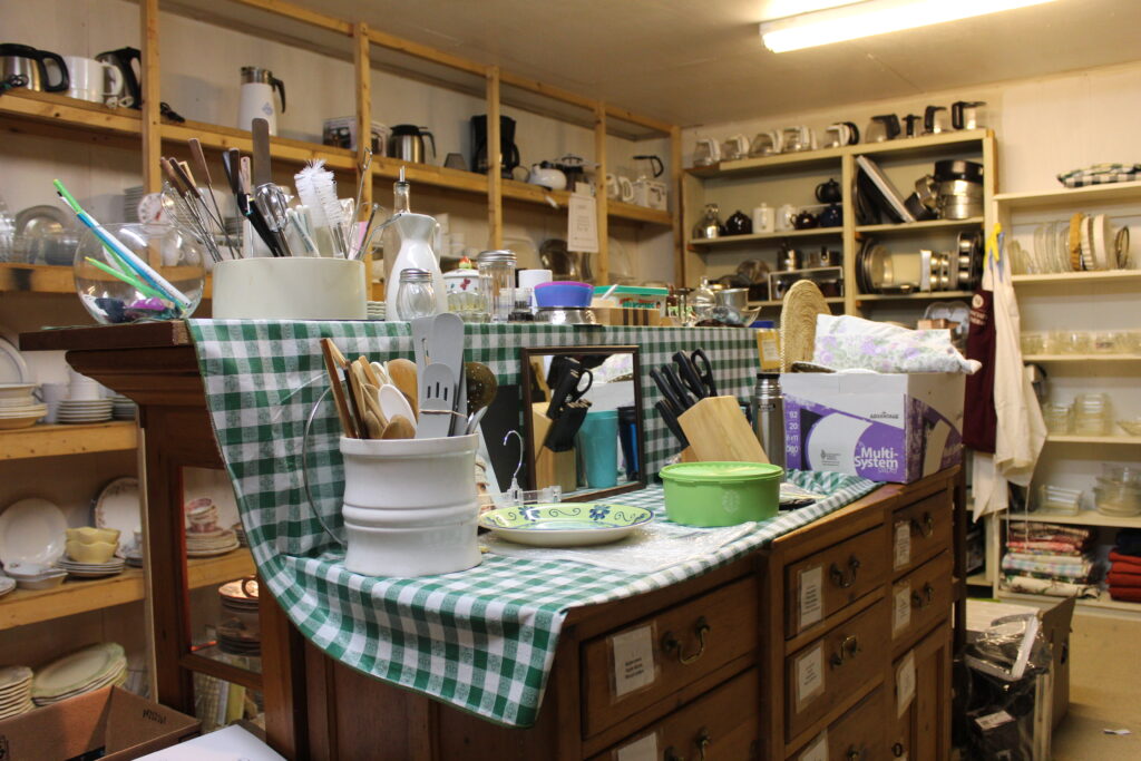 Kitchen appliances and utensils in a storage room at the Interfaith Warehouse