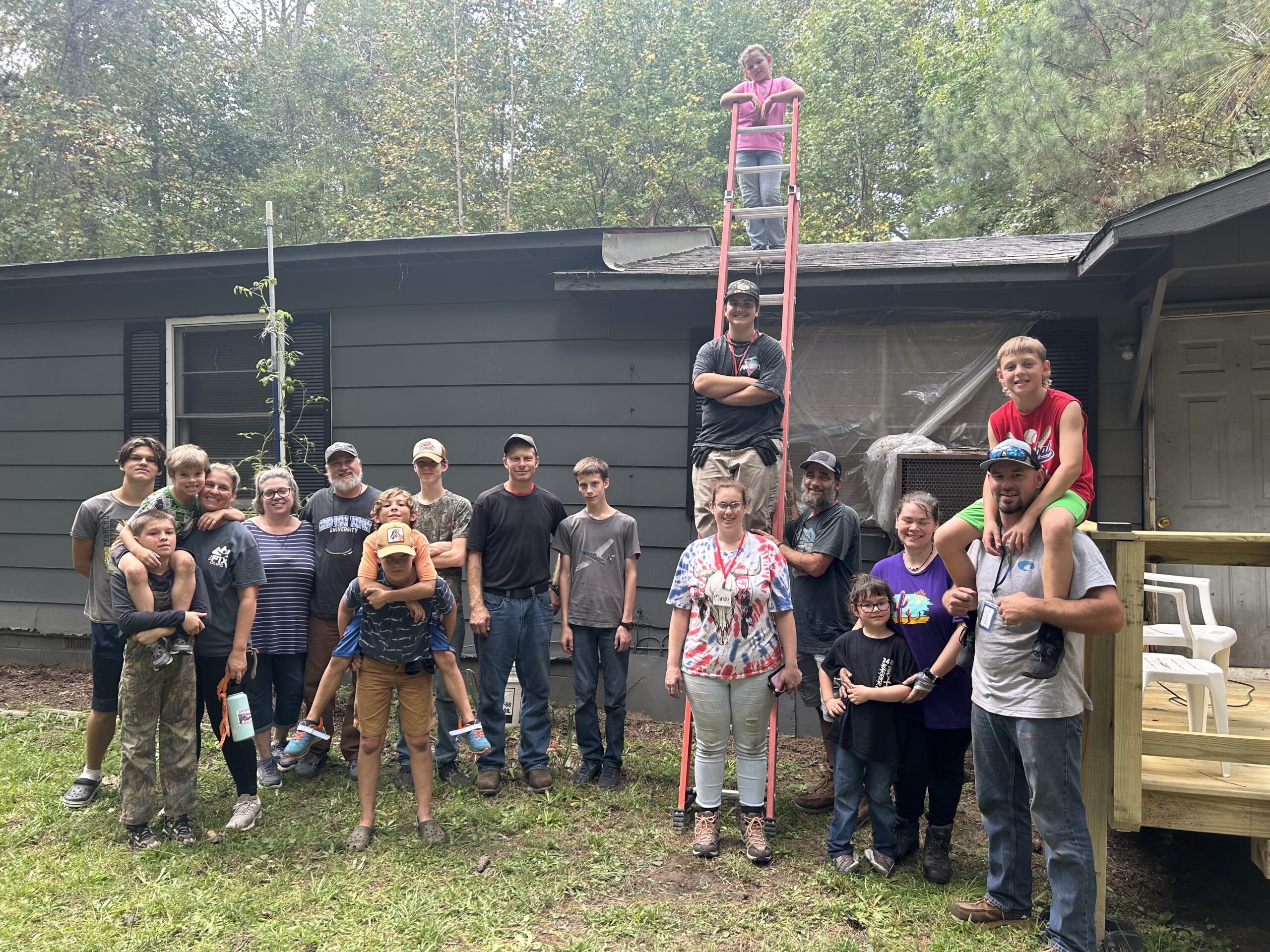 Interfaith volunteers from New Kent Christian reroof a home in Lancaster County.