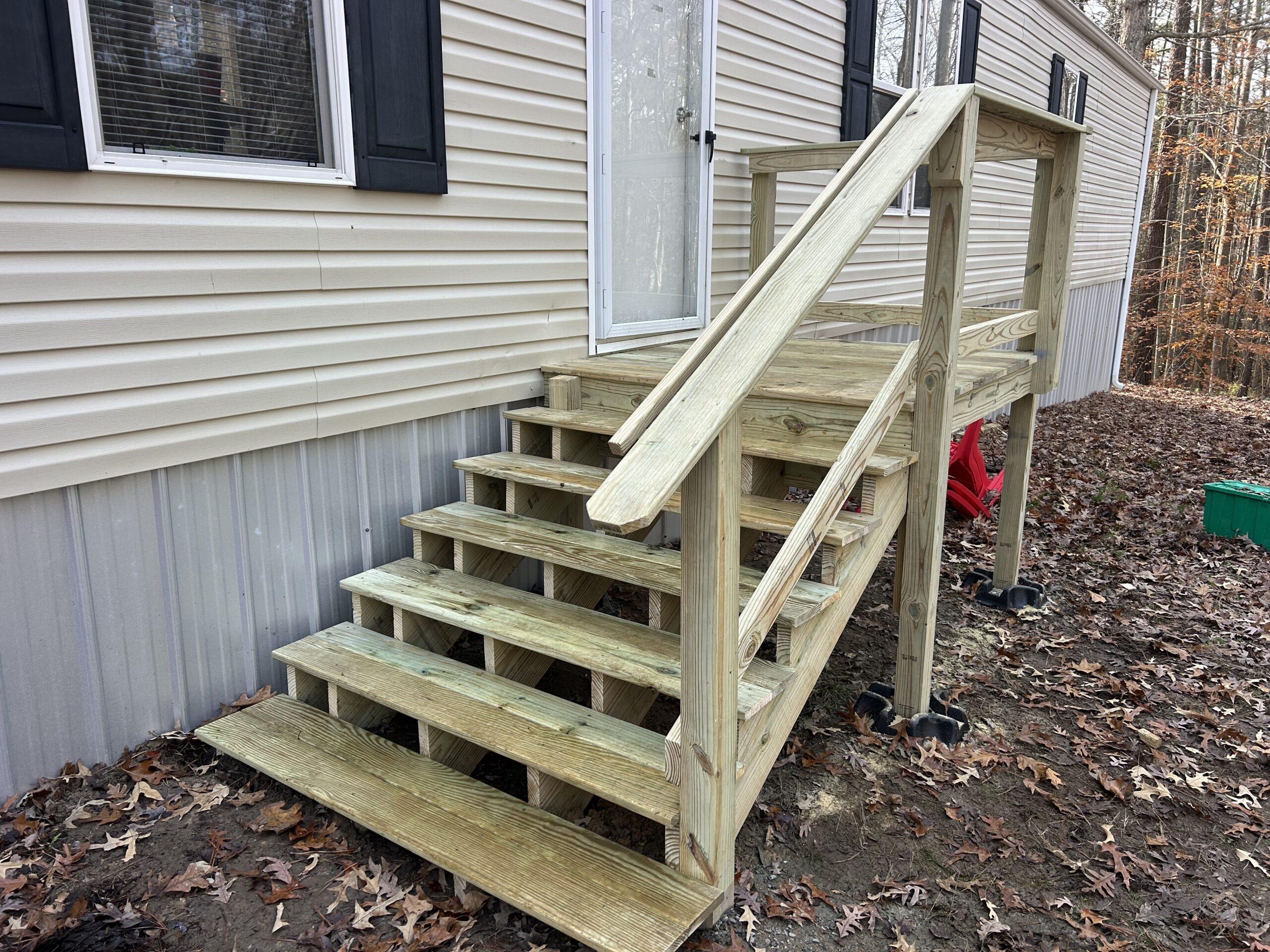 A recently rebuilt stoop on a house in Lancaster Virginia